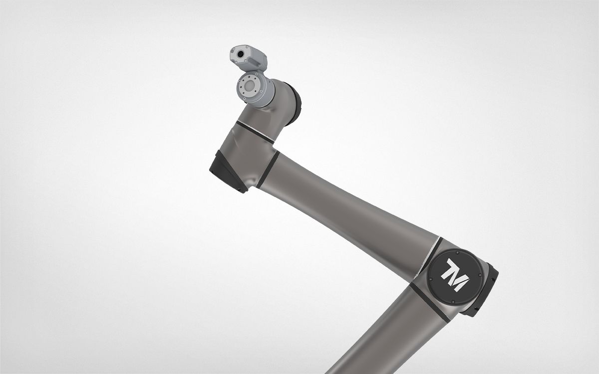 TM AI Cobot standing tall — compact footprint with long reach